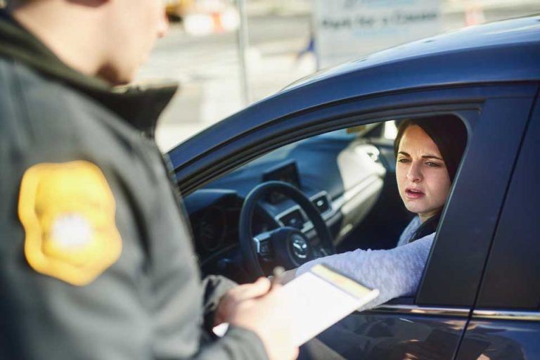 Cop Writing Speeding Ticket